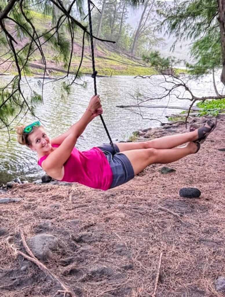 me on a rope swing by a pond in pololu valley