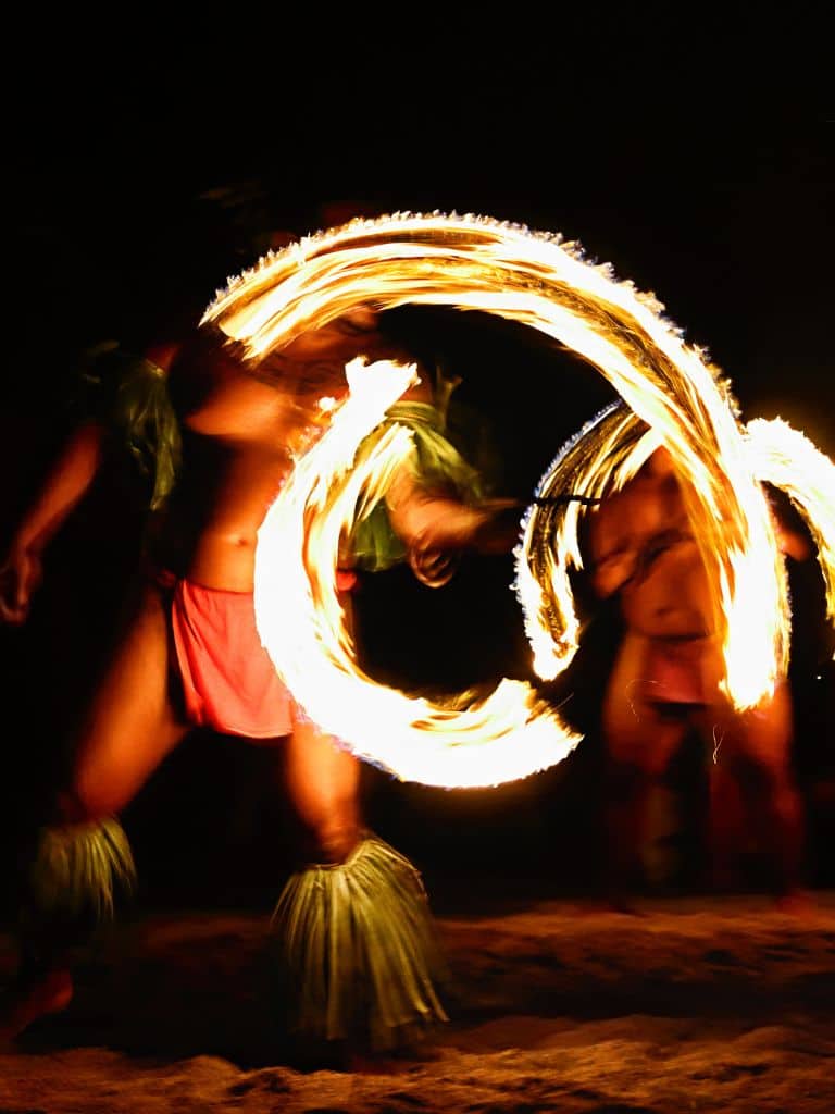 Luau fire dancers with spinning fire