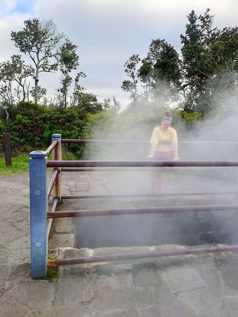 Me warming my hands over steam vents