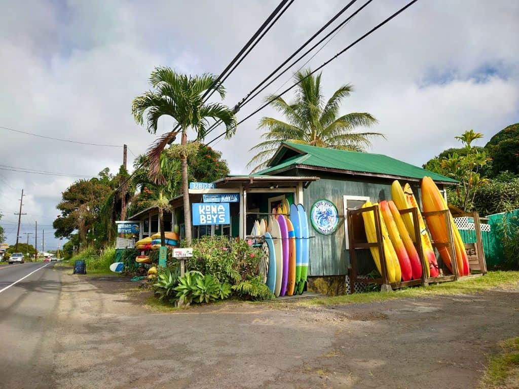 Kona Boys shop with kayaks and paddleboards racked up on the outside