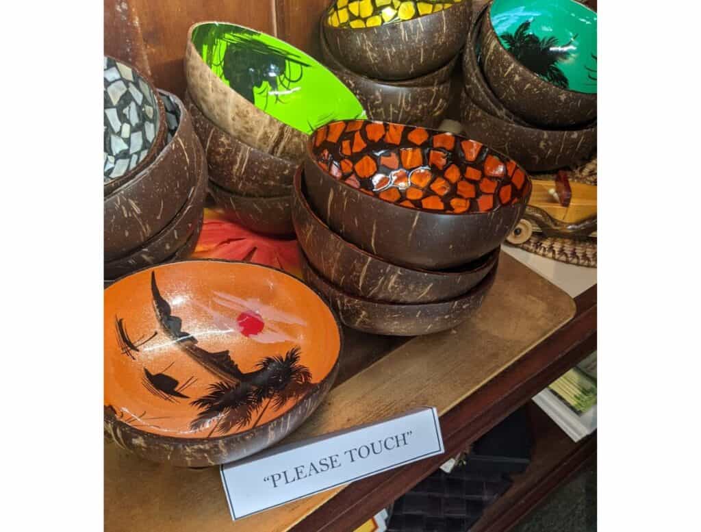 Coconut bowls painted on the inside for sale at Volcano Garden Arts