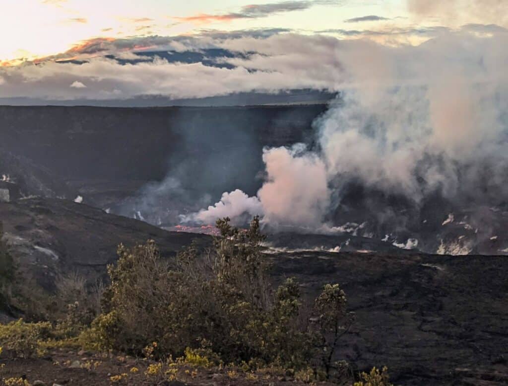 View of Kilauea Crater with lava in it from Keanakako'i Overlook at sunset