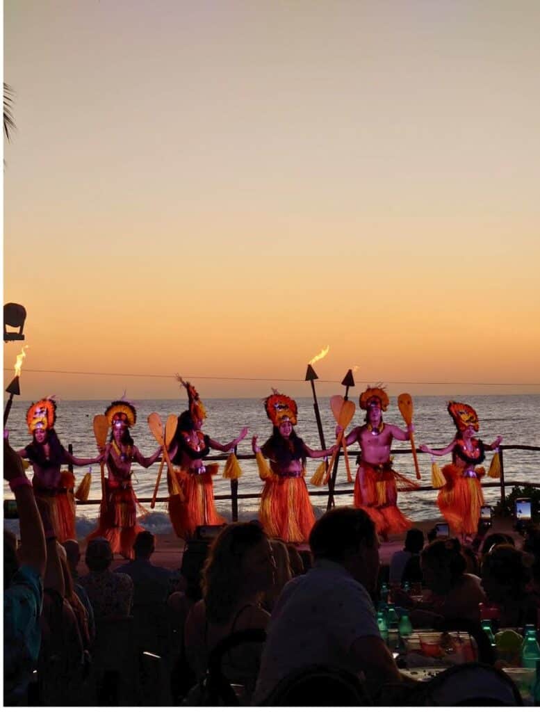 hula dancers at sunset at the Voyagers of the Pacific Luau