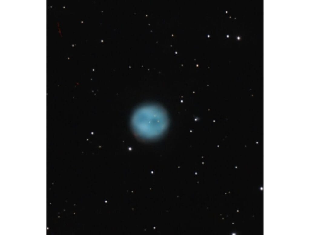 blue orb in space with stars taken with a telescope