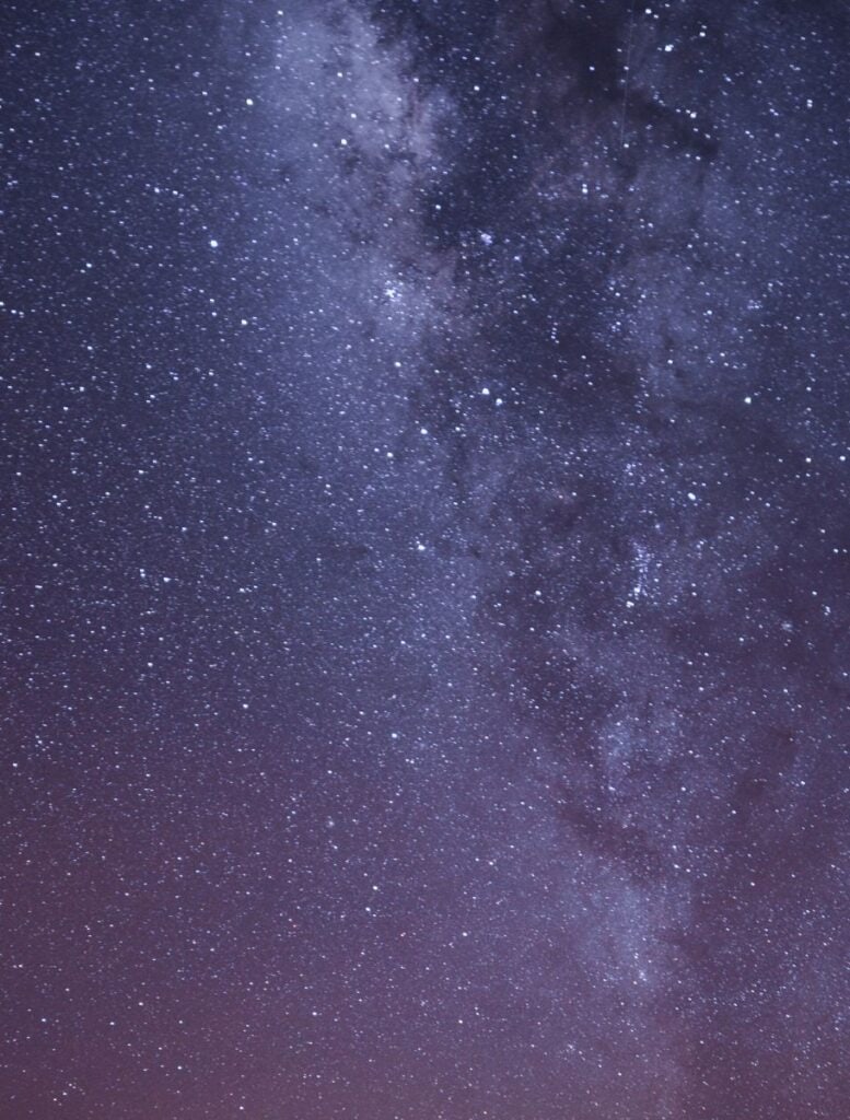 milky way galaxy against a purpley sky