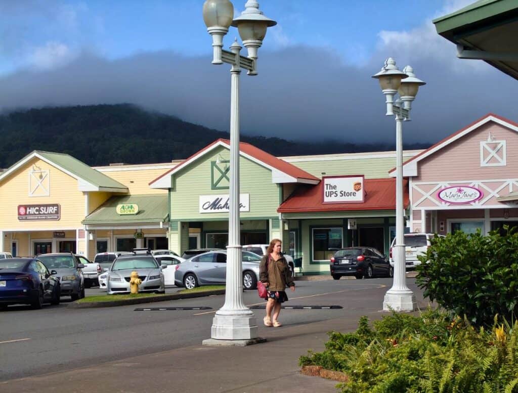 Parker Ranch shopping center with multicolored shop faces and parking lot