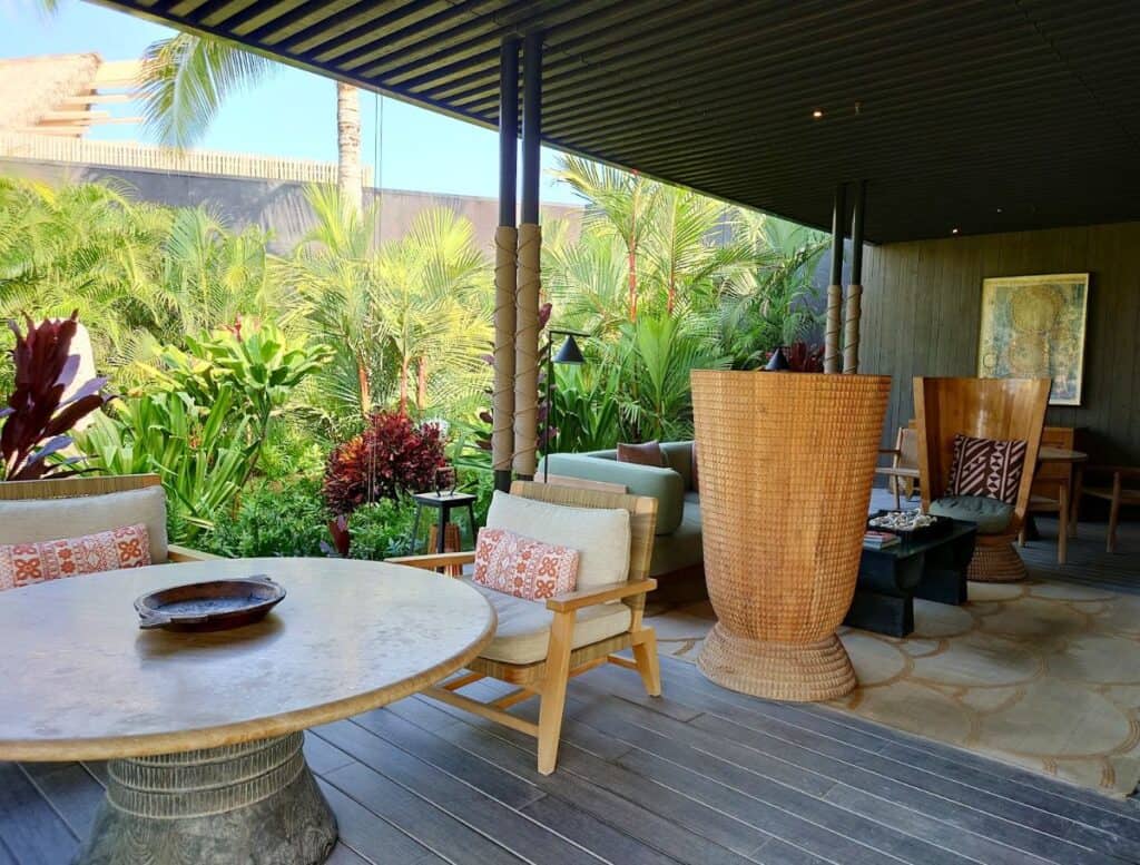 a patio with a table and chairs