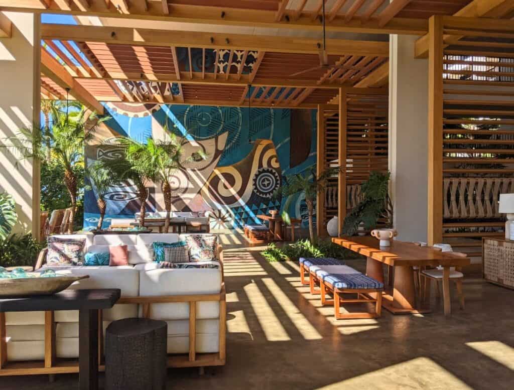 Mauna Lani lounge area with abstract hawaiian mural on wall