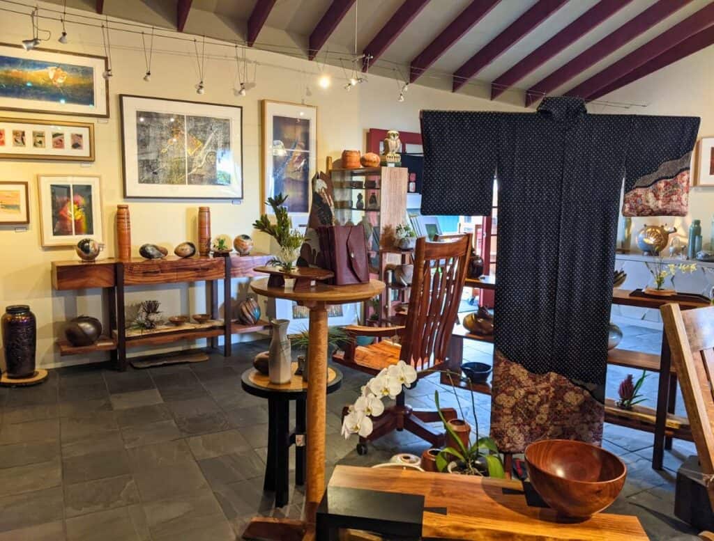 Dovetail Gallery interior with art pieces and japanese kimono hanging